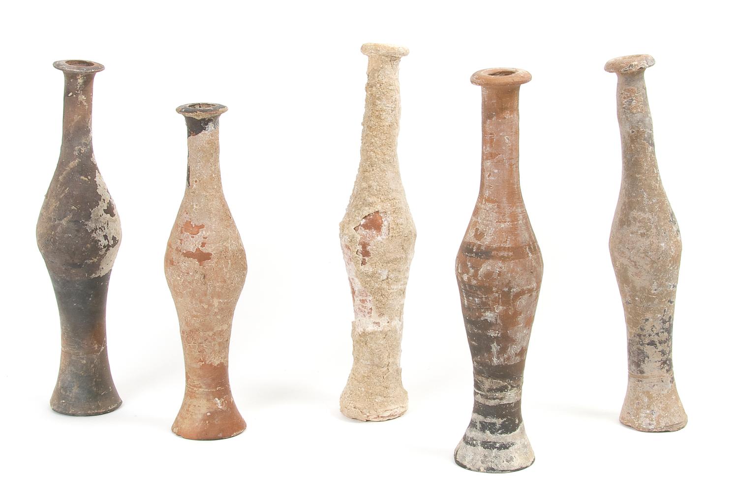 A Collection of Five Near East Earthenware Unguentariums, Height of tallest 8 3/4 inches.
