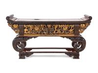 A Japanese Red Lacquered Wood Low Table