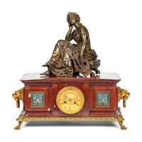 A French Bronze, Marble and Champlevé Clock Garniture