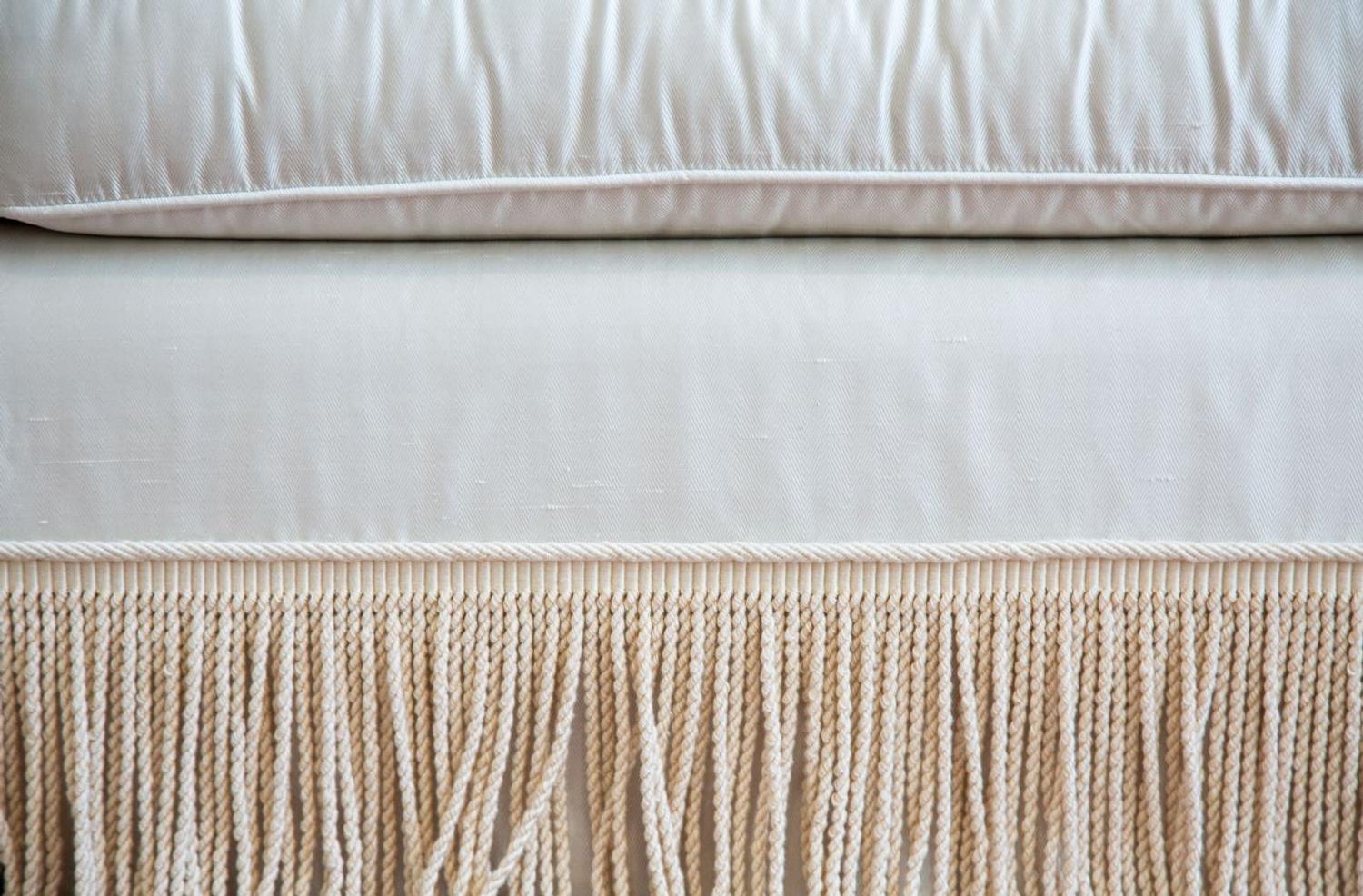 A Three Cushion Linen Silk Upholstered Sofa — 20TH CENTURY
