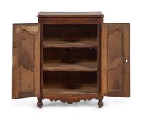 A French Provincial Carved Walnut Diminutive Armoire