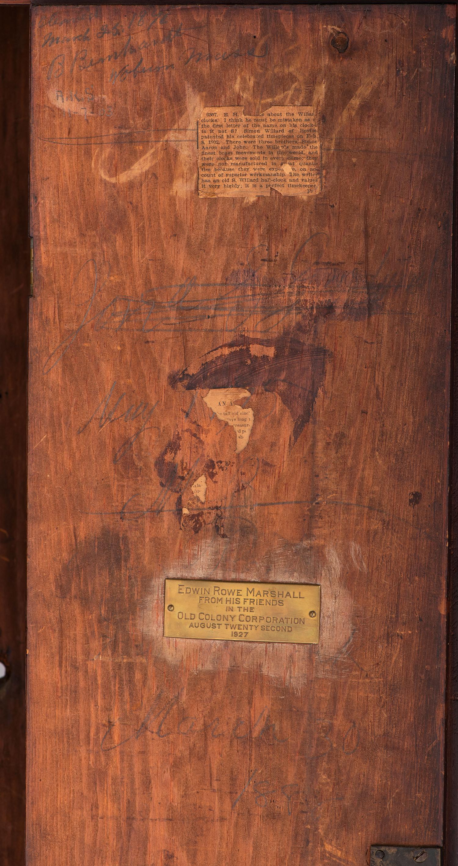 An American Mahogany Brass-Mounted, Inlaid and Carved Mahogany Tall Case Clock