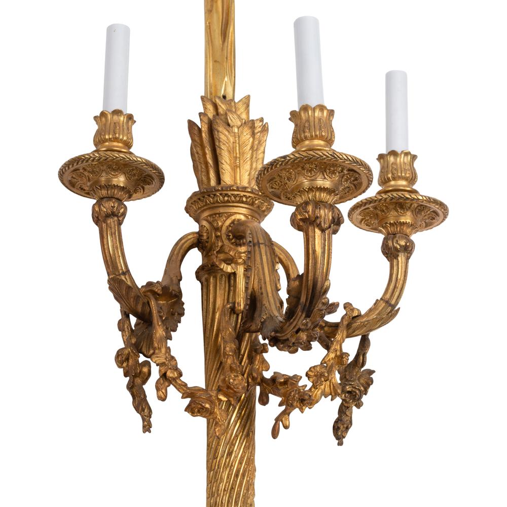 A Set of Four Large French Gilt Bronze Three-Light Sconces