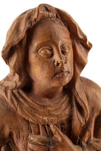 A Continental Carved Fruitwood Saint Figure