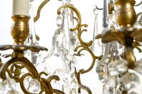 A French Gilt Bronze and Cut Glass Six-Light Chandelier