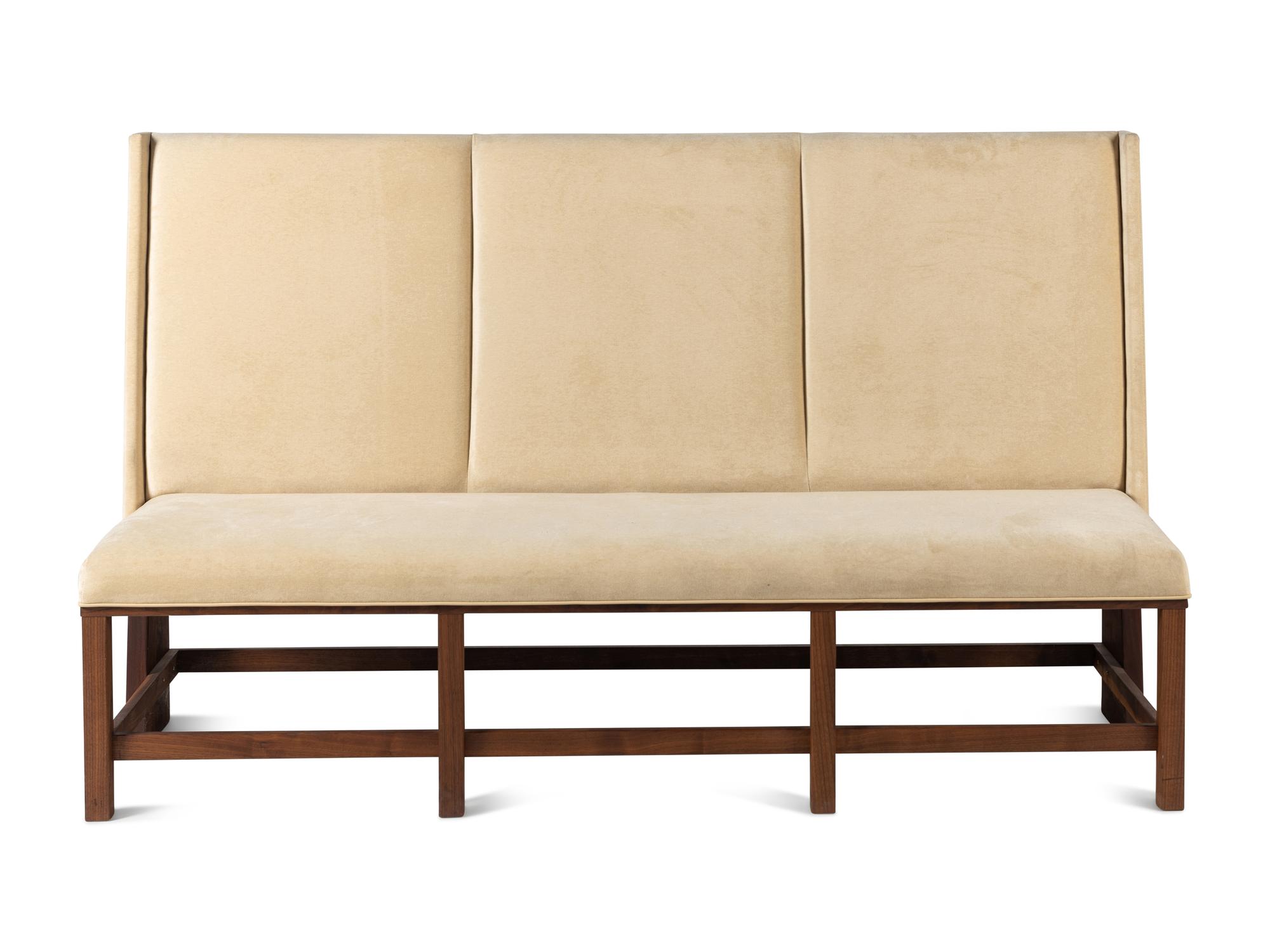 A Custom Upholstered Walnut Banquette