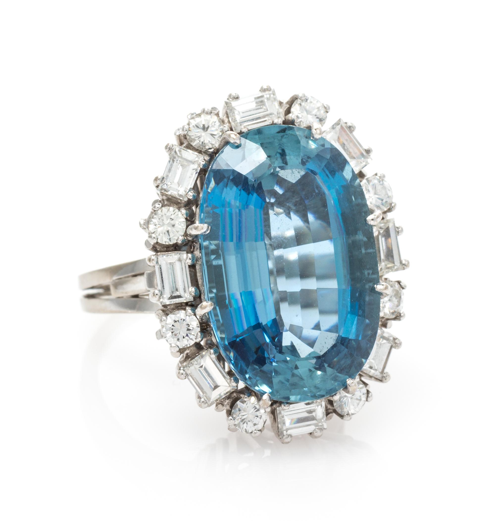 An 18 Karat White Gold, Aquamarine and Diamond Ring, 7.00 dwts.