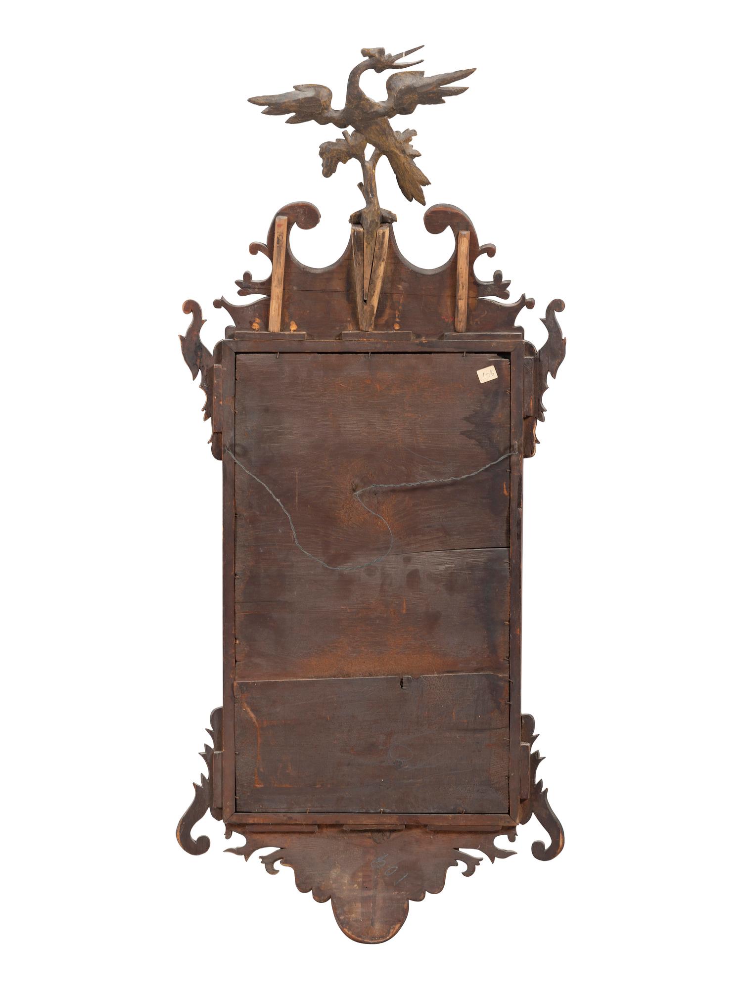 A Chippendale Carved and Parcel Gilt Mahogany Looking Glass