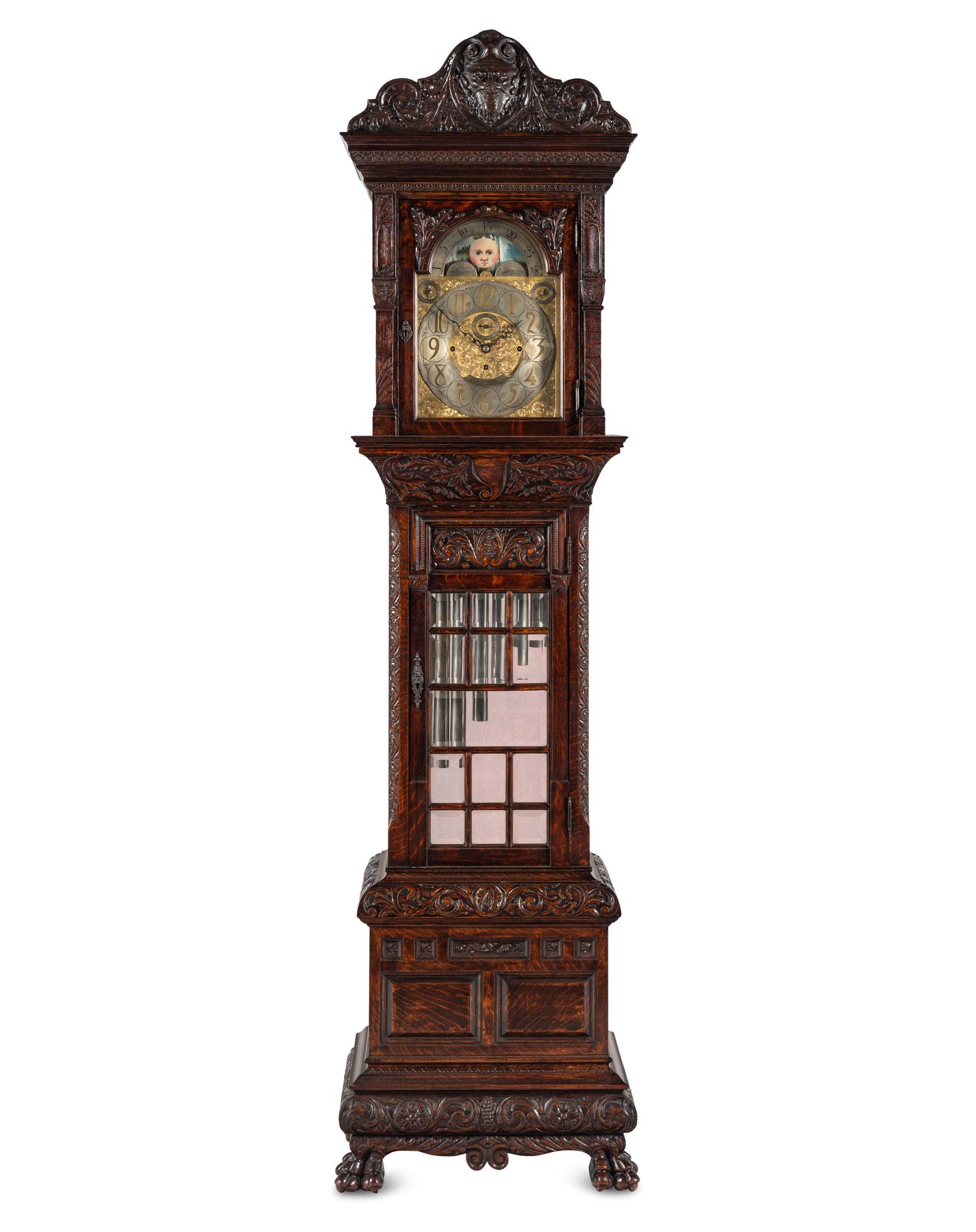 A Renaissance Revival Carved Oak Eight-Tube Tall Case Clock