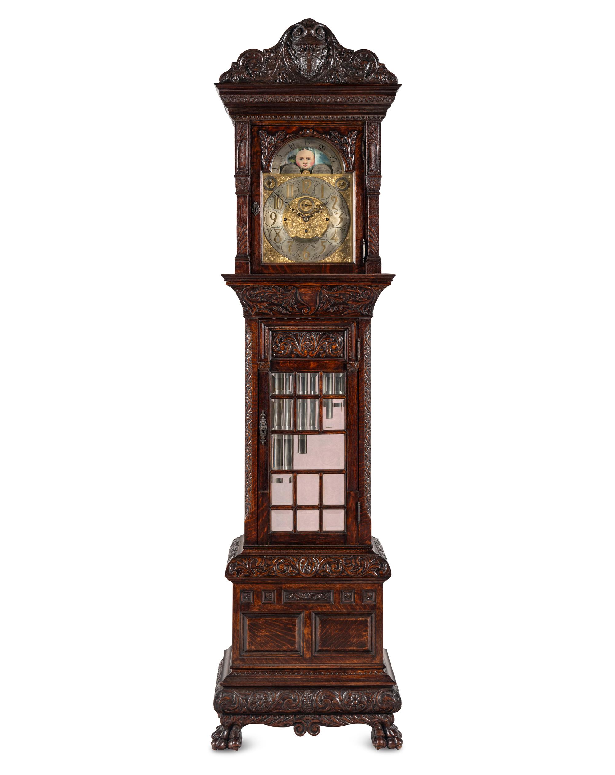 A Renaissance Revival Carved Oak Eight-Tube Tall Case Clock