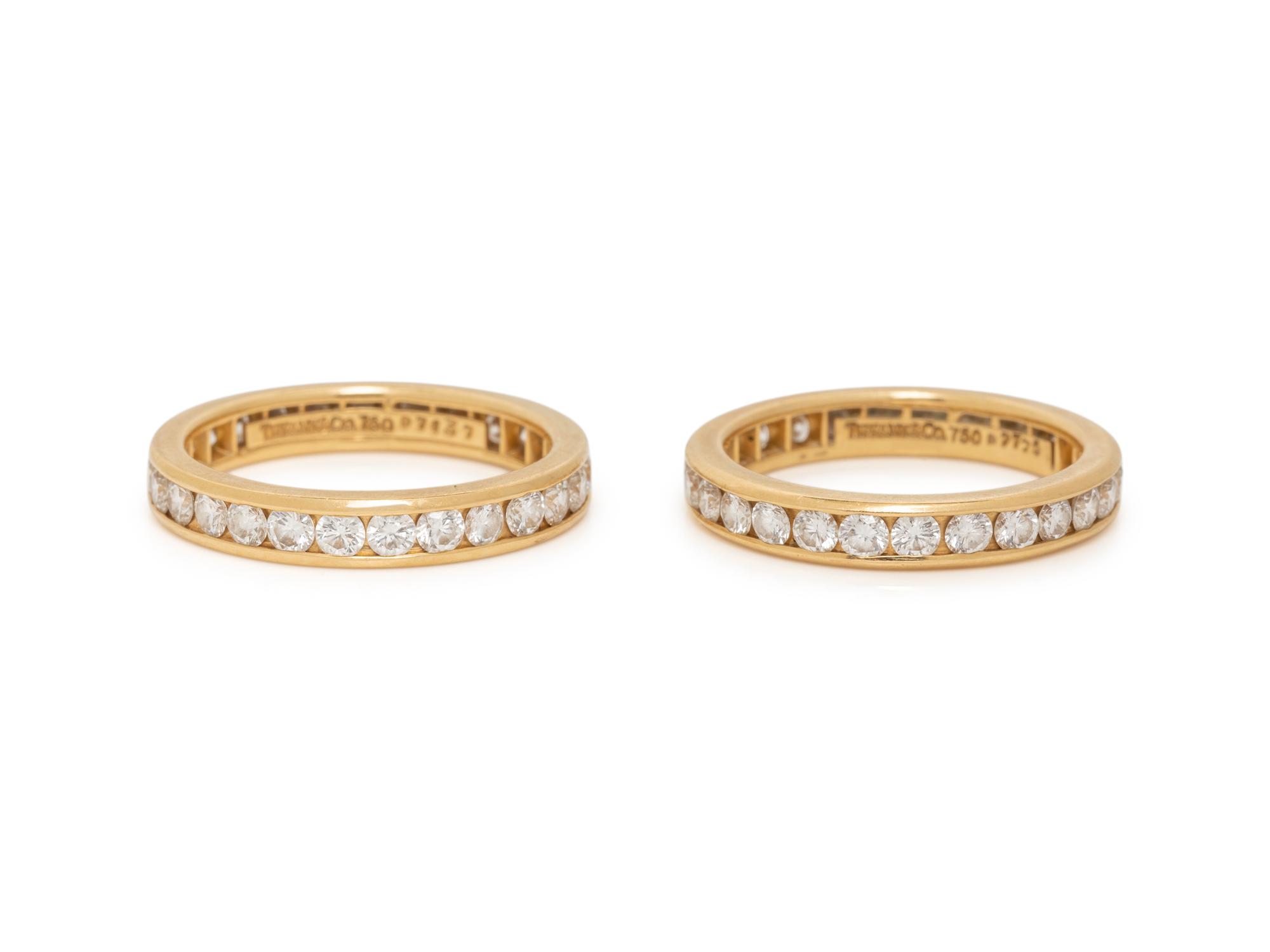 TIFFANY & CO., PAIR OF YELLOW GOLD AND DIAMOND ETERNITY BAND RINGS