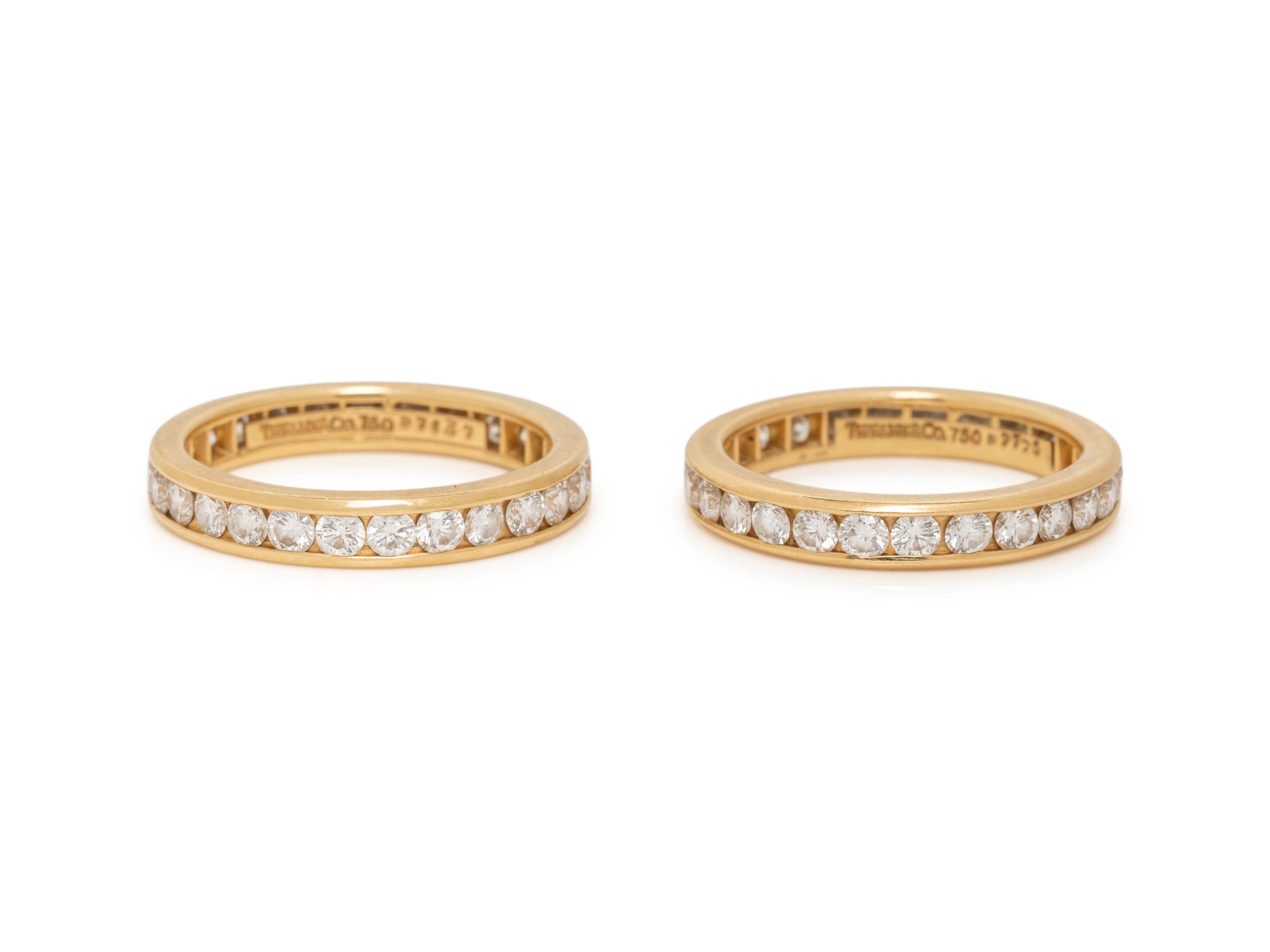 TIFFANY & CO., PAIR OF YELLOW GOLD AND DIAMOND ETERNITY BAND RINGS