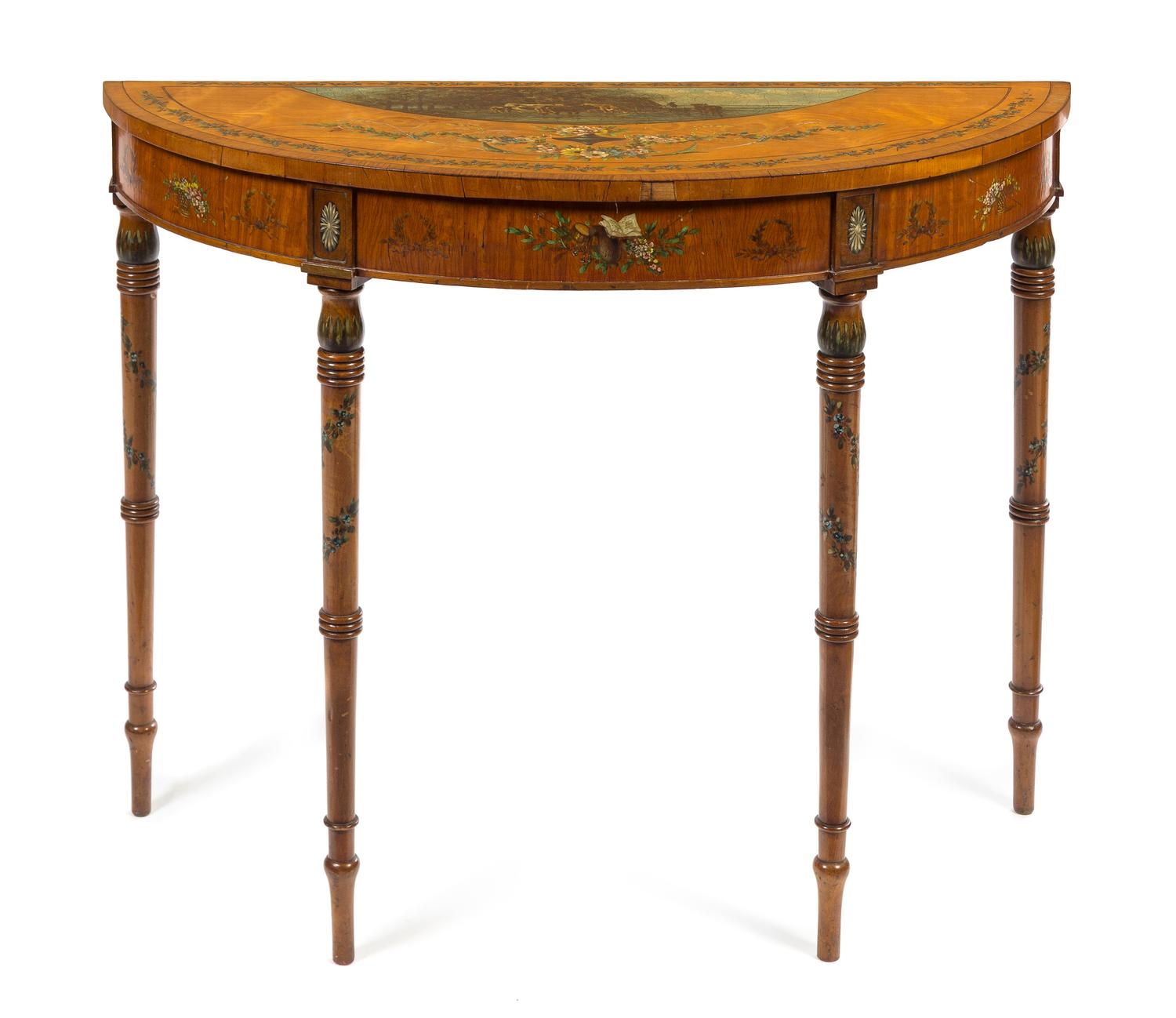 An Edwardian Painted Fruitwood Console Table Height 31 x width 40 1/2 x depth 15 1/4 inches. — CIRCA 1910