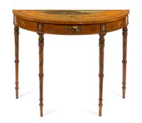 An Edwardian Painted Fruitwood Console Table Height 31 x width 40 1/2 x depth 15 1/4 inches. — CIRCA 1910