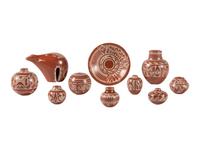 Miniature White-on-Red Pottery Jars, Plate, and Bear