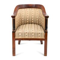 A Biedermeier Walnut and Ebonized Bergere