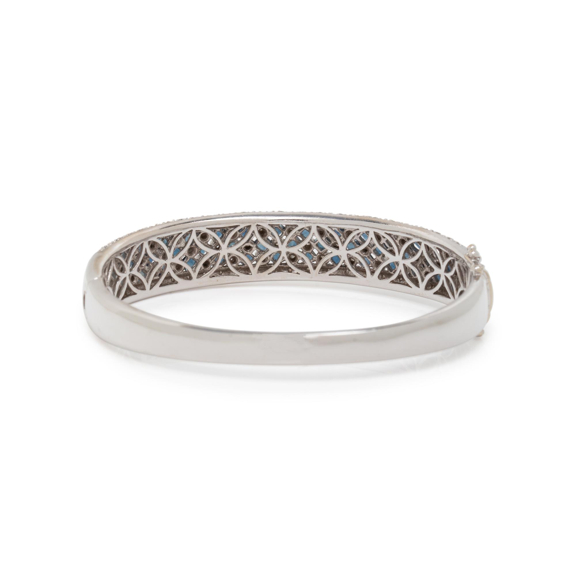 WHITE GOLD, DIAMOND AND SAPPHIRE BANGLE BRACELET