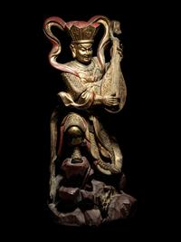 A Set of Four Gilt and Red Lacquered Wood Figures of Guardians