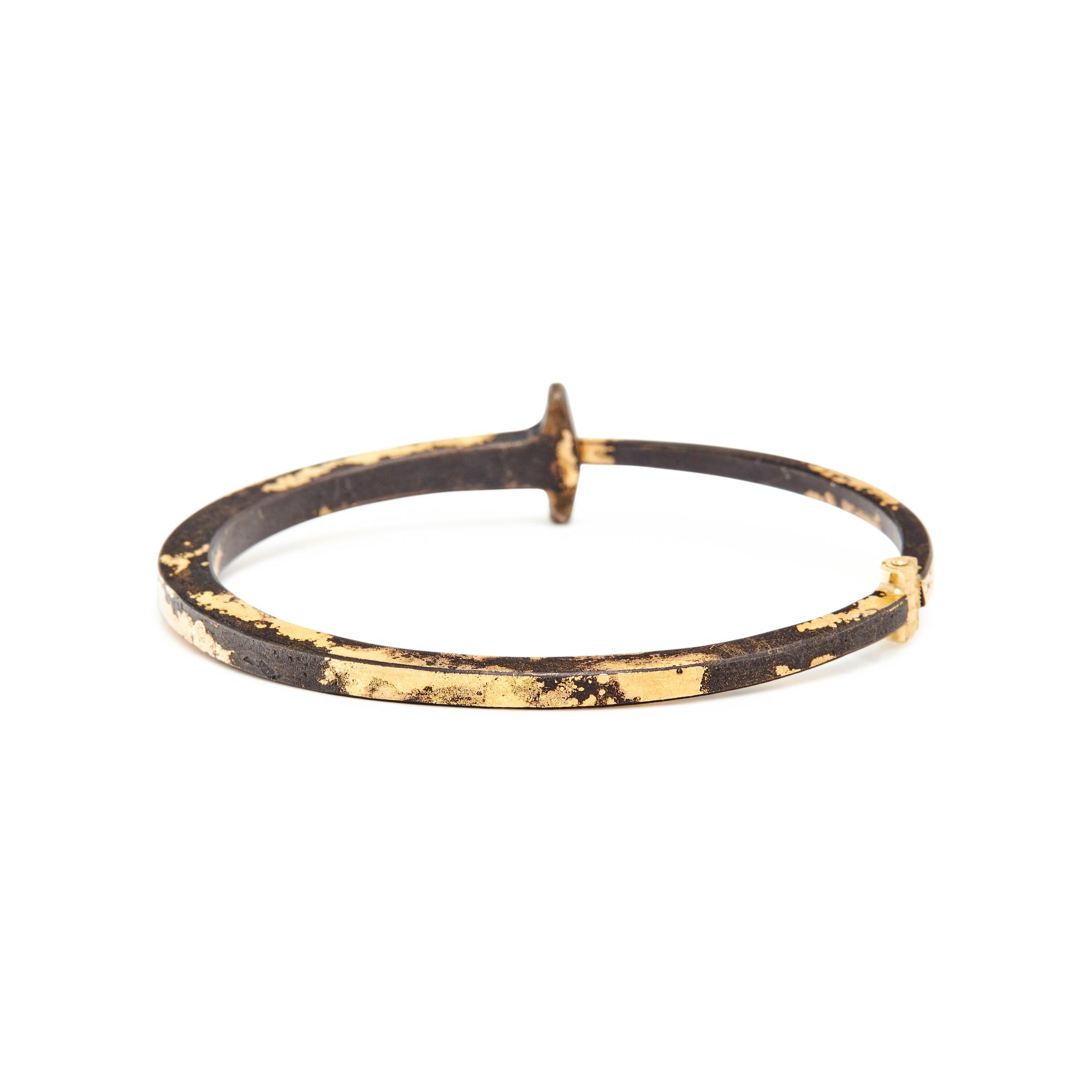 PAT FLYNN, IRON AND HIGH KARAT GOLD NAIL BANGLE