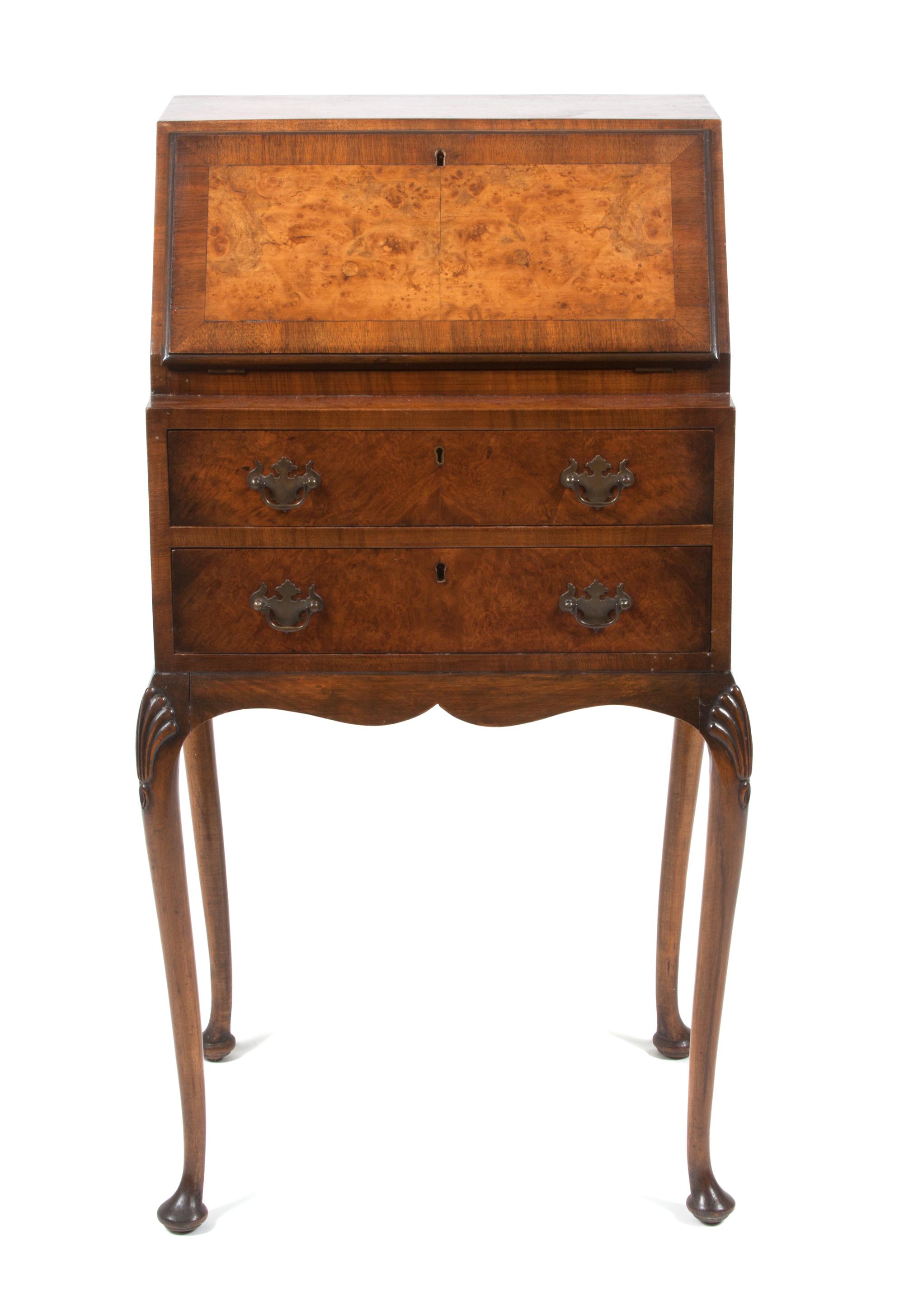 A Queen Anne Style Walnut Lady's Writing Desk Height 38 3/4 x width 21 1/2 x depth 16 1/2 inches. — 20TH CENTURY