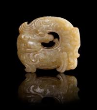A Mottled Yellow Jade Toggle Length 2 1/4 inches.