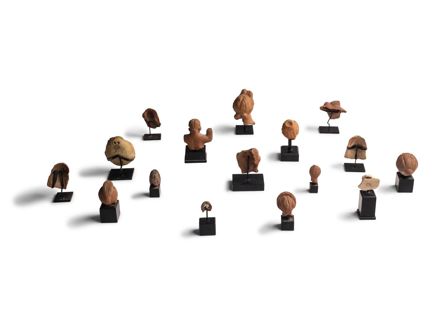 Sixteen Greco-Roman Terracotta Heads and Figures