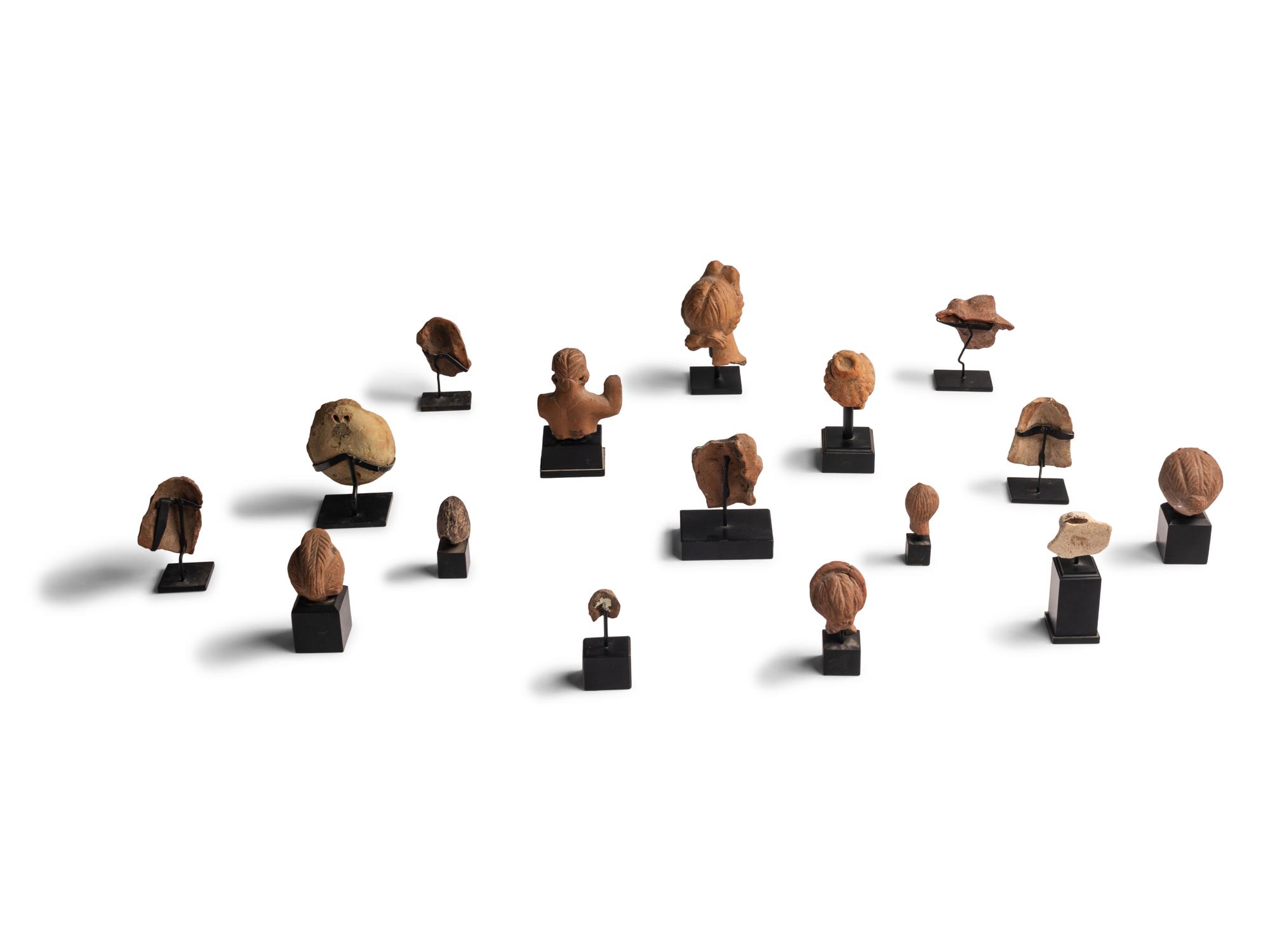 Sixteen Greco-Roman Terracotta Heads and Figures