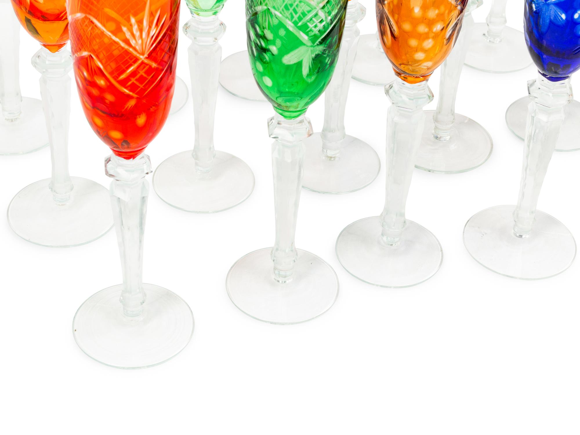 A Set of Eighteen Colored Cut-to-Clear Glass Goblets