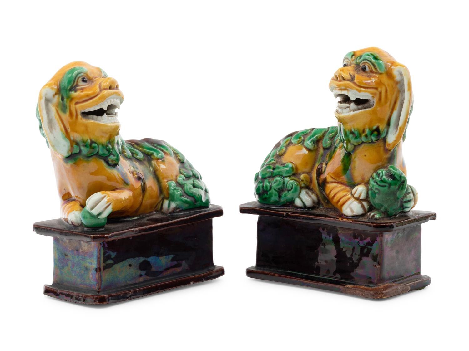 Nine Chinese Porcelain Figures of Fu Lions
