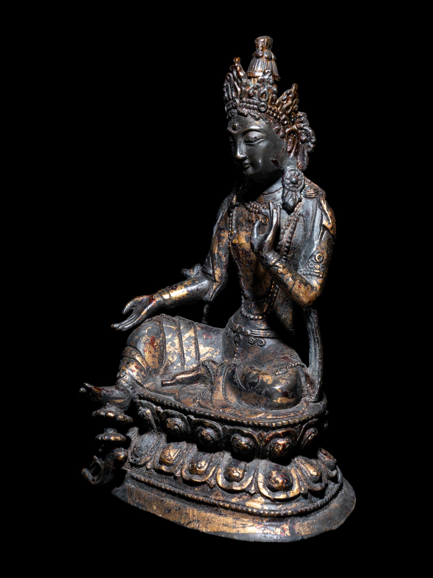 A Sino-Tibetan Parcel Gilt Bronze Figure of a Bodhisattva