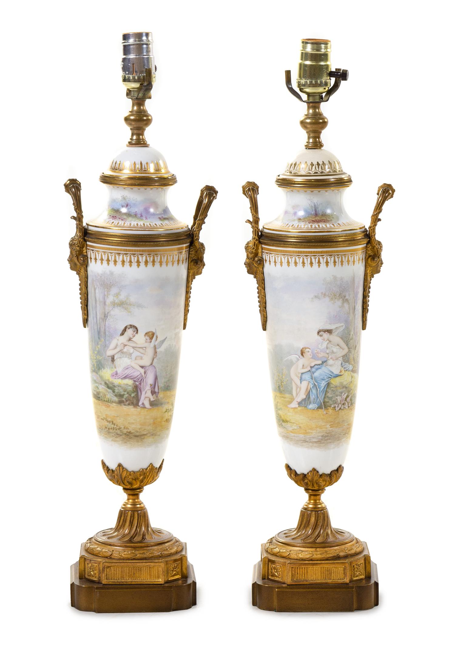 A Pair of Gilt Bronze Mounted Sèvres Style Porcelain Urns