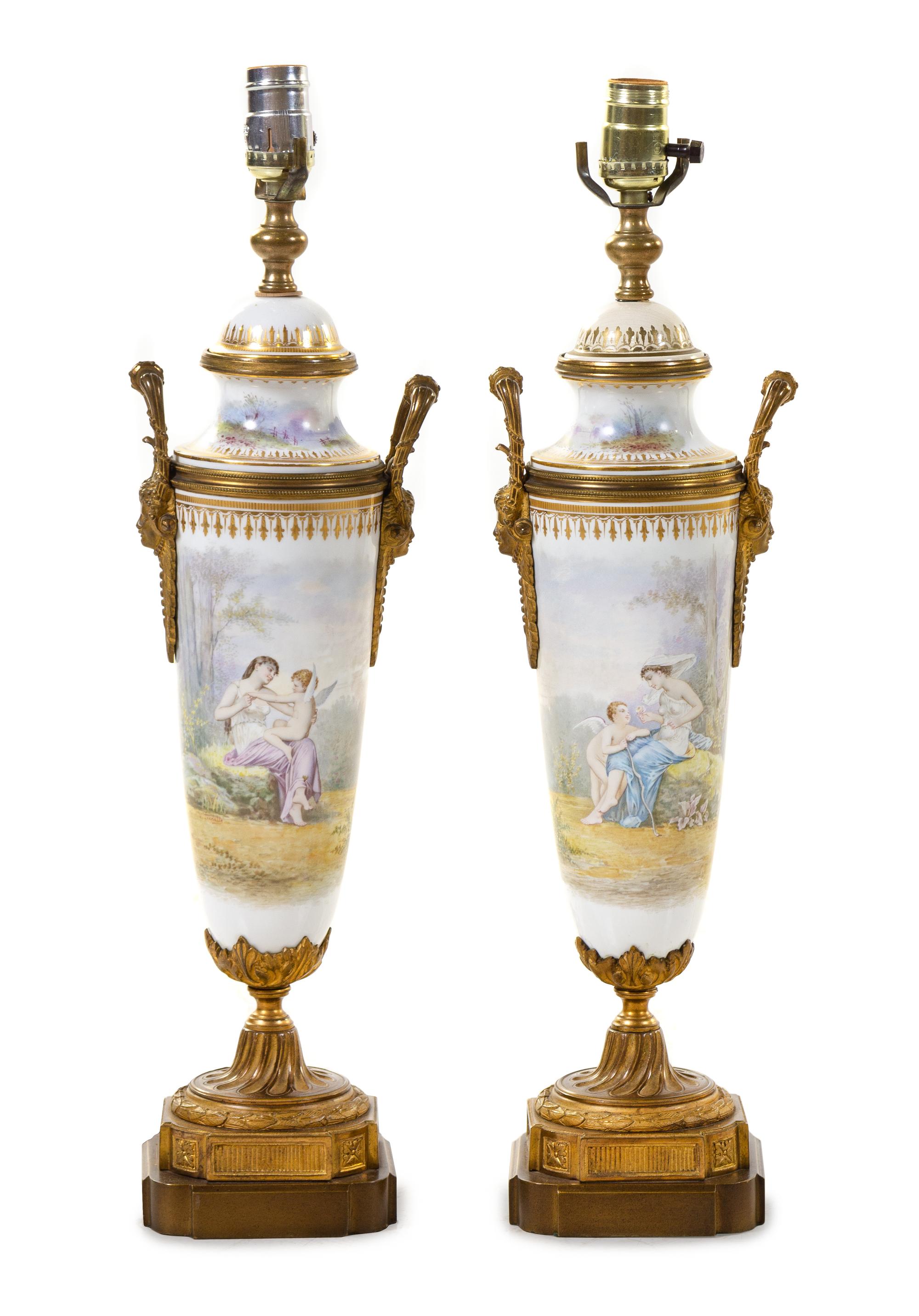 A Pair of Gilt Bronze Mounted Sèvres Style Porcelain Urns