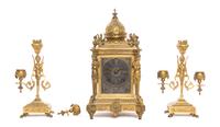 A French Gilt Bronze Assembled Clock Garniture, Height of clock 13 inches.