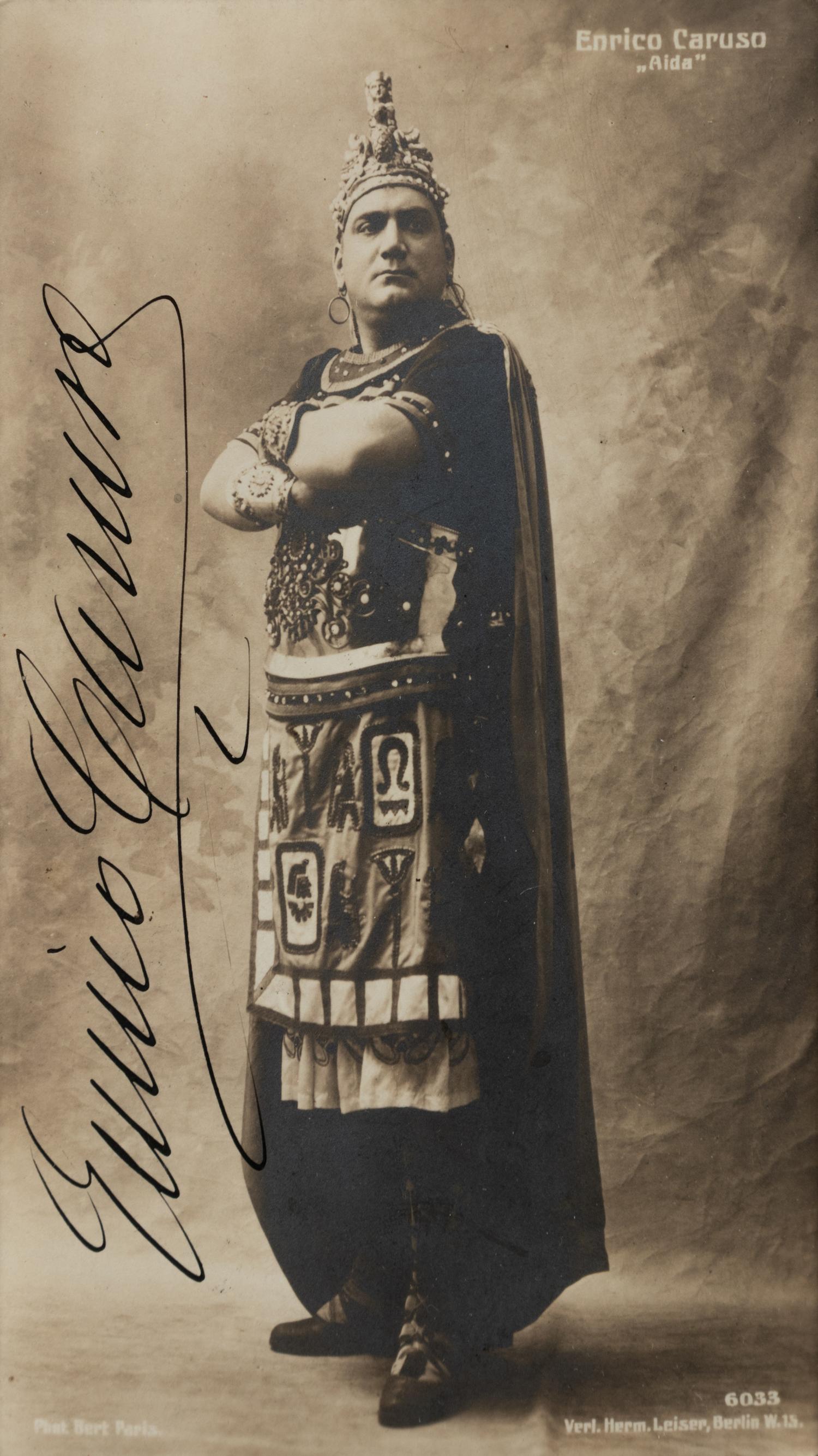 CARUSO, Enrico (1873-1921). Sepia photograph as Radames signed ("Enrico Caruso"), by Herm. Leiser, n.d.