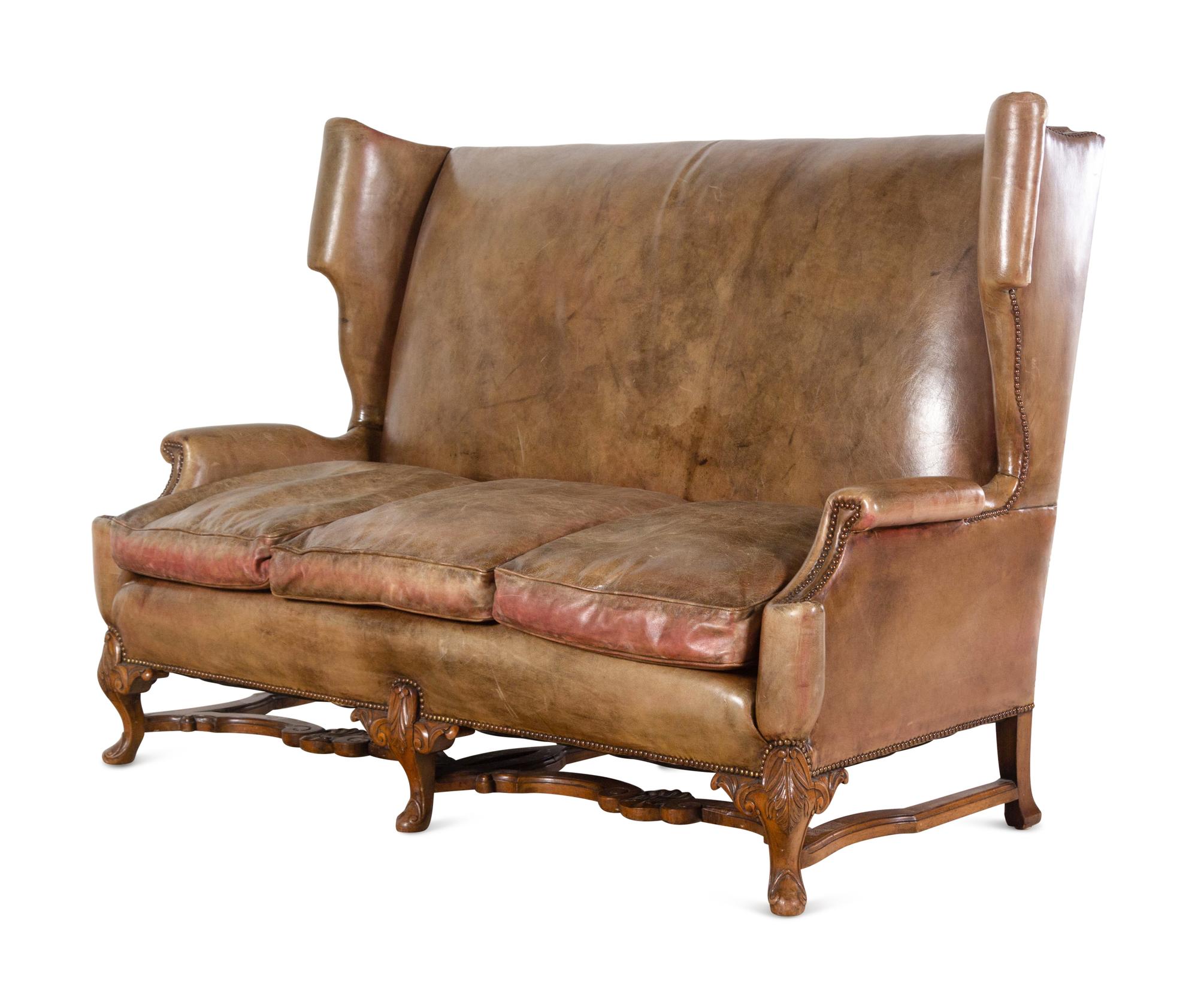 An English Leather-Upholstered Wingback Sofa