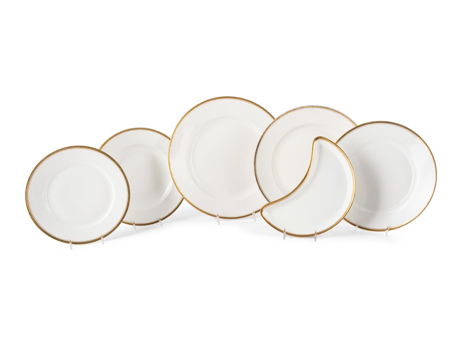 A Limoges Gilt Porcelain Dinner Service