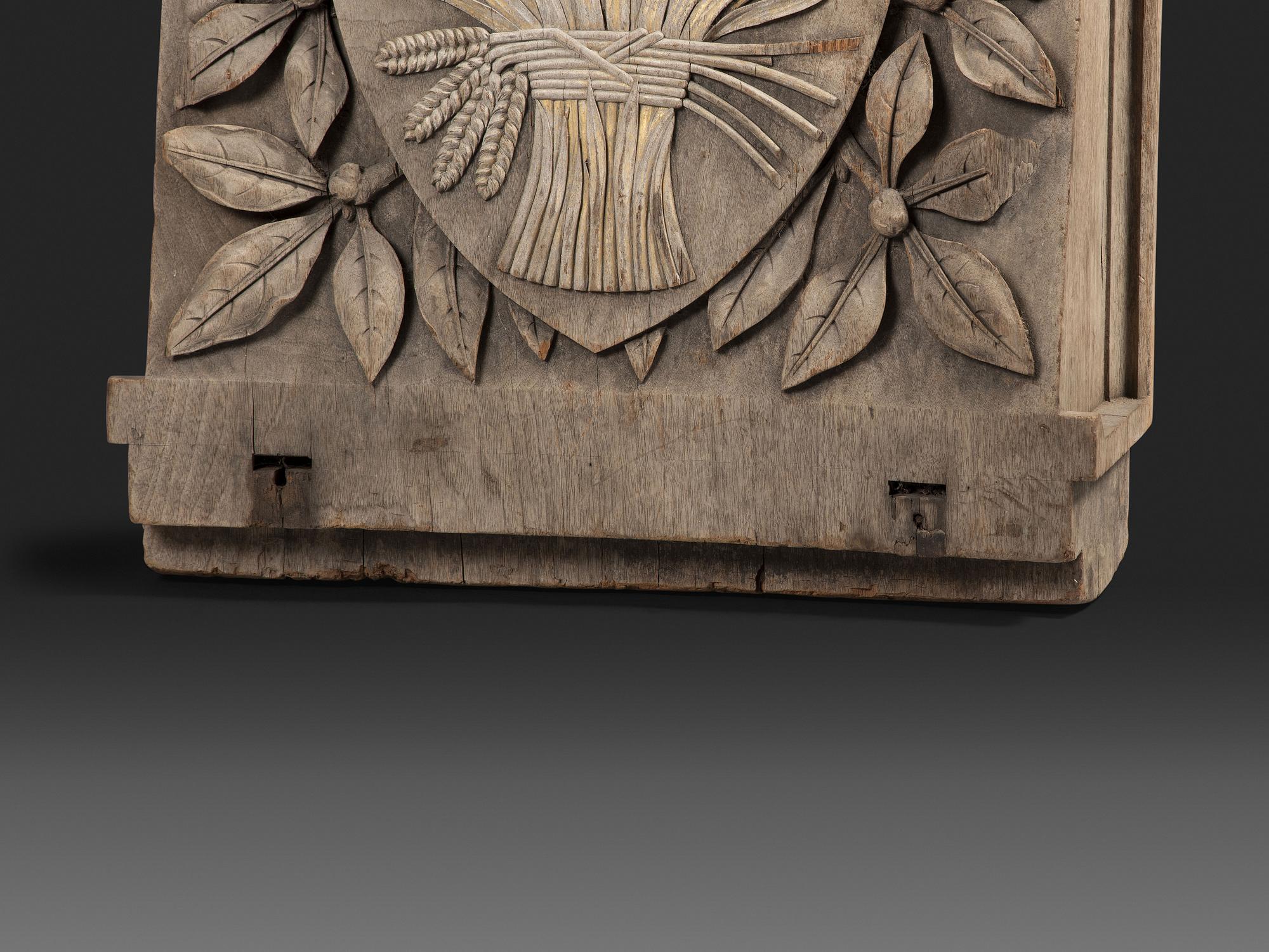 A Pair of English Carved Wood Baker's Shop Architectural Panels
