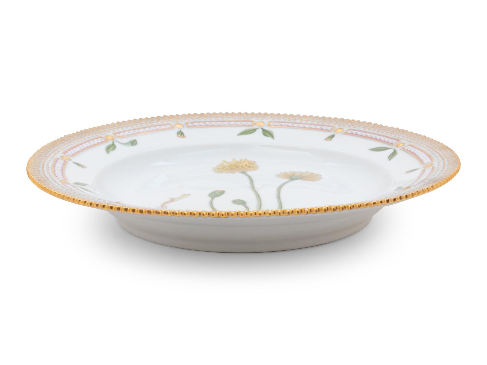 A Set of Twelve Royal Copenhagen Flora Danica Porcelain Dinner Plates