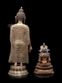 A Sino-Tibetan Gilt Bronze Figure of Buddha and A Bronze Figure of Standing Buddha
