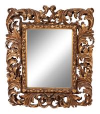 An Italian Baroque Style Giltwood Mirror
