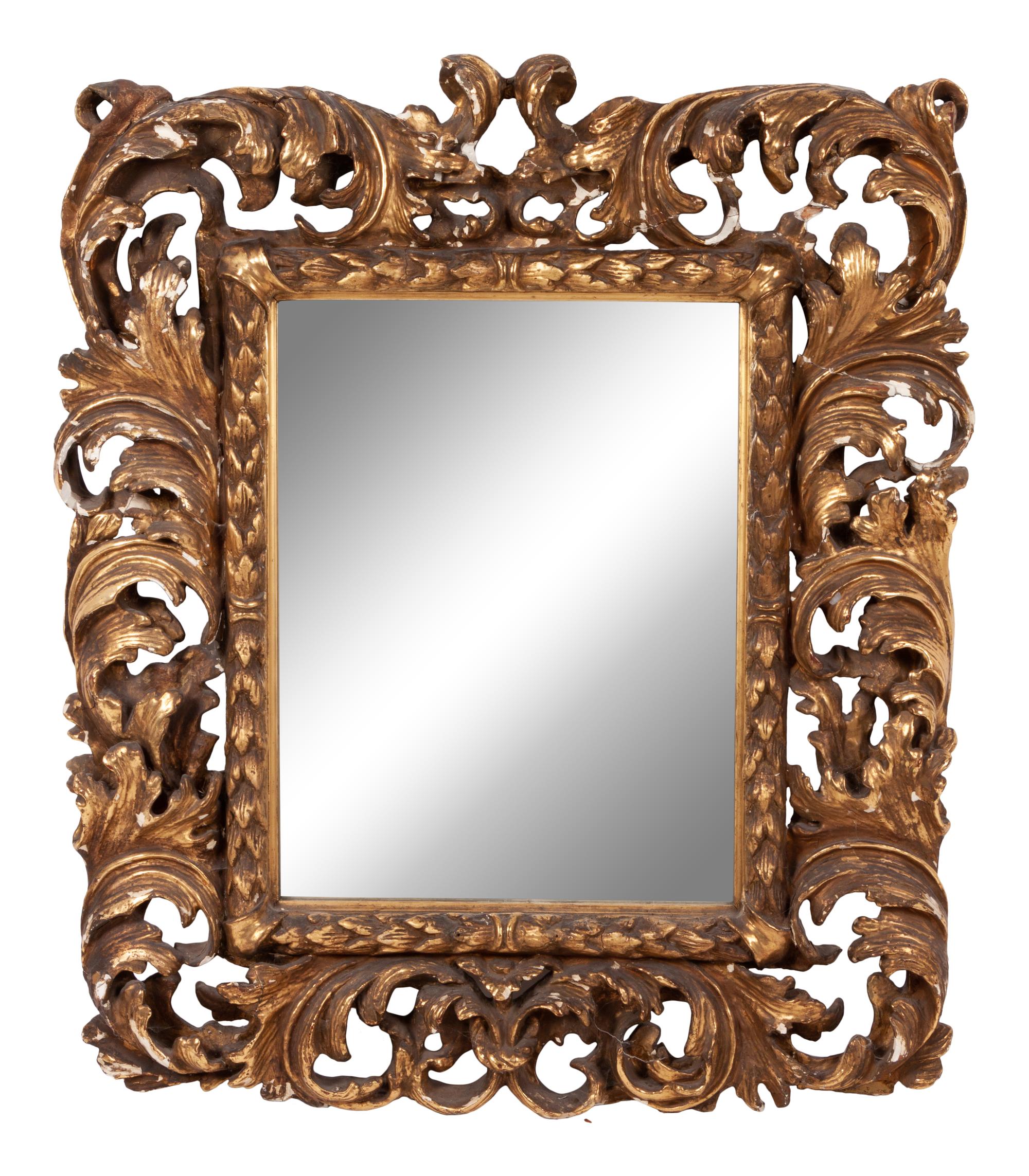 An Italian Baroque Style Giltwood Mirror