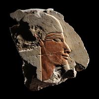 An Egyptian Limestone Relief Fragment with a Nile God