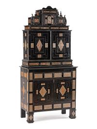 A Continental Pewter Inlaid and Ebonized Cabinet