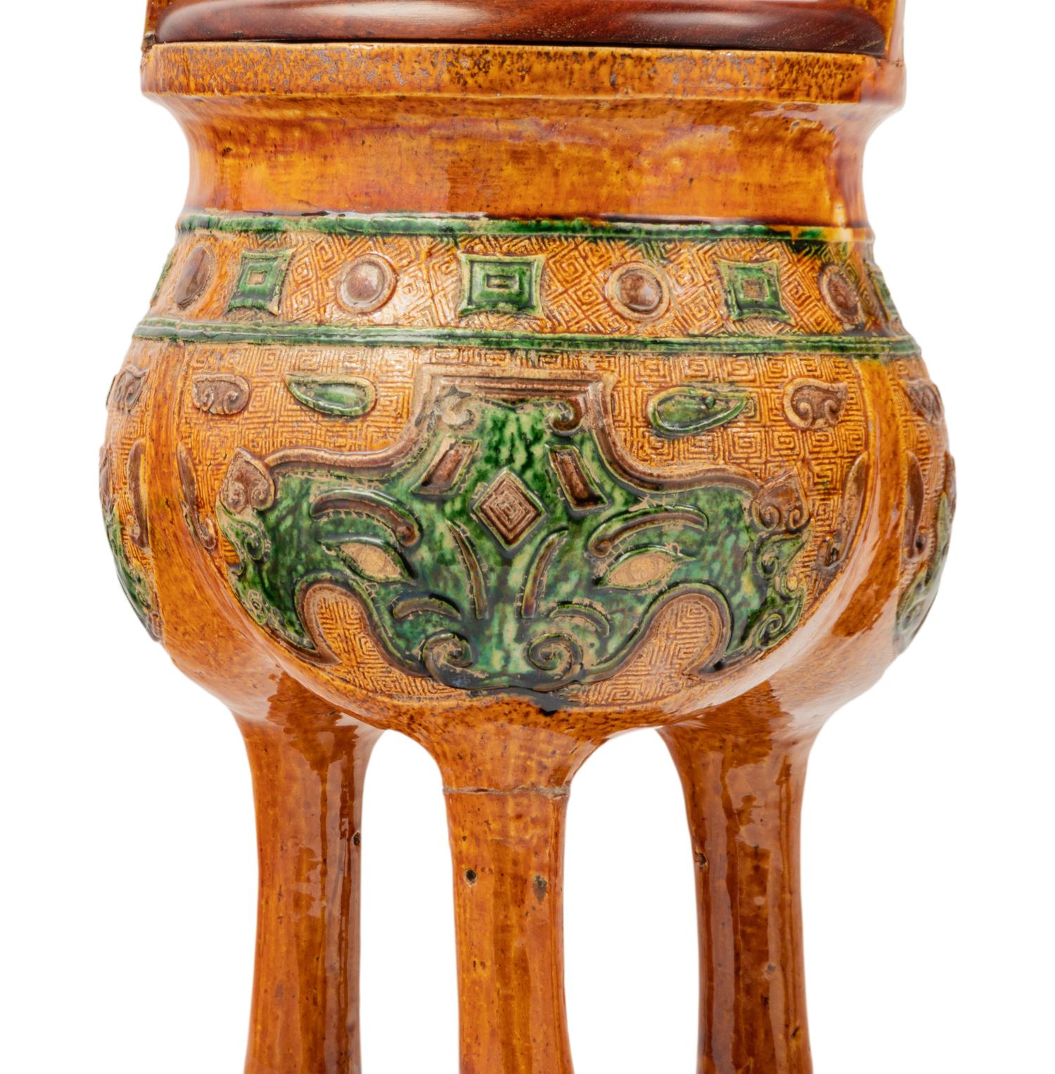 A Pair of Chinese Sancai Glazed Porcelain Tripod Ding Vessels