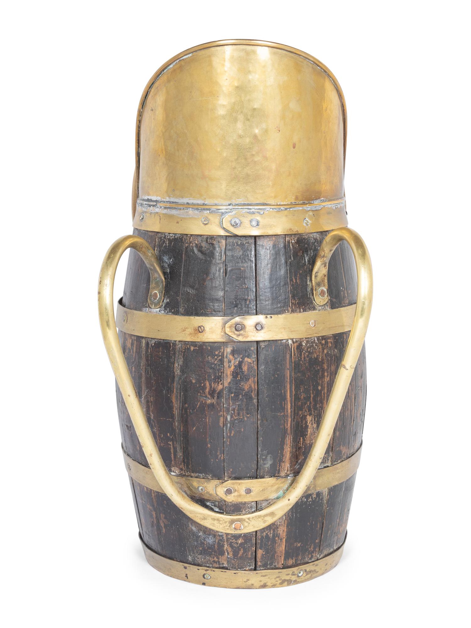 An English Brass Mounted Oak Jug