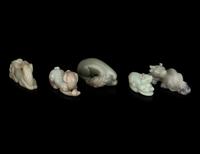 Five Chinese Carved Celadon Jade Figures of Recumbent Animals