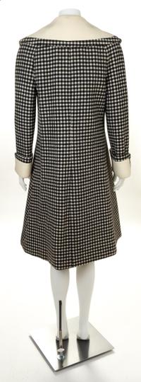 A Geoffrey Beene Black and Cream Wool Double Breasted Check Coat, No size.