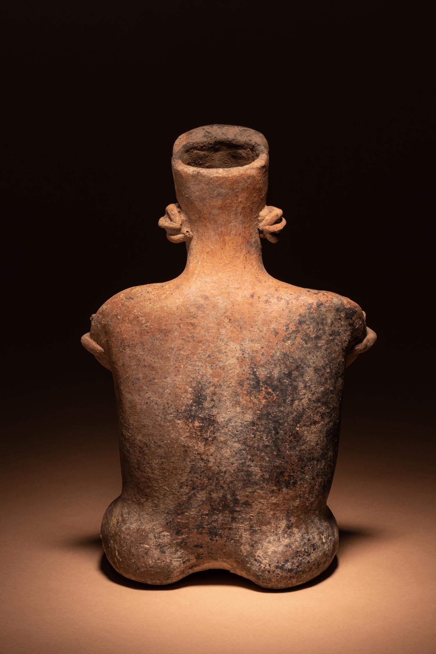 A Nayarit Terracotta Seated Female Figure