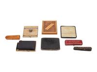 A Group of Eight Cigarette Cases and Holders