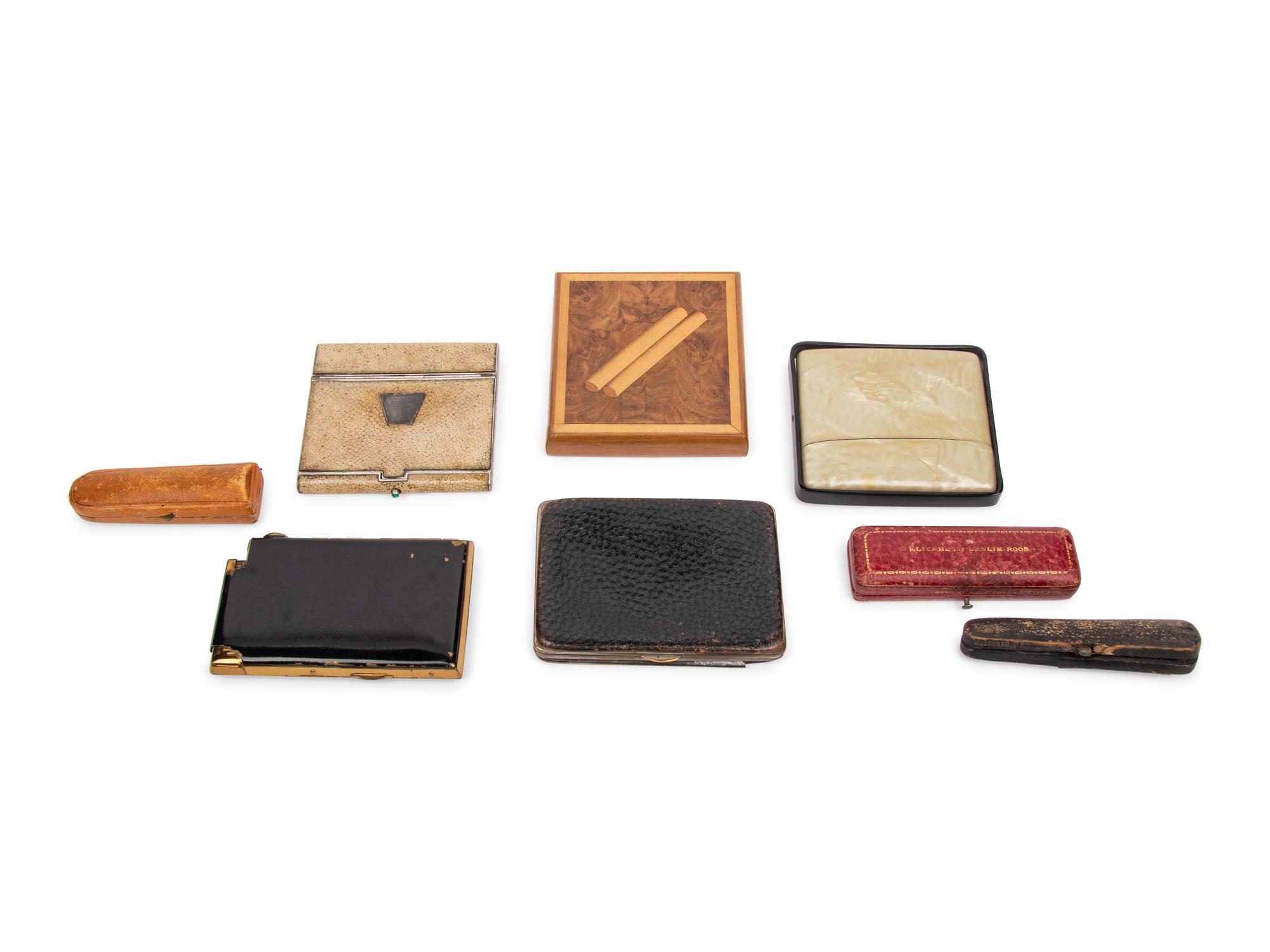 A Group of Eight Cigarette Cases and Holders
